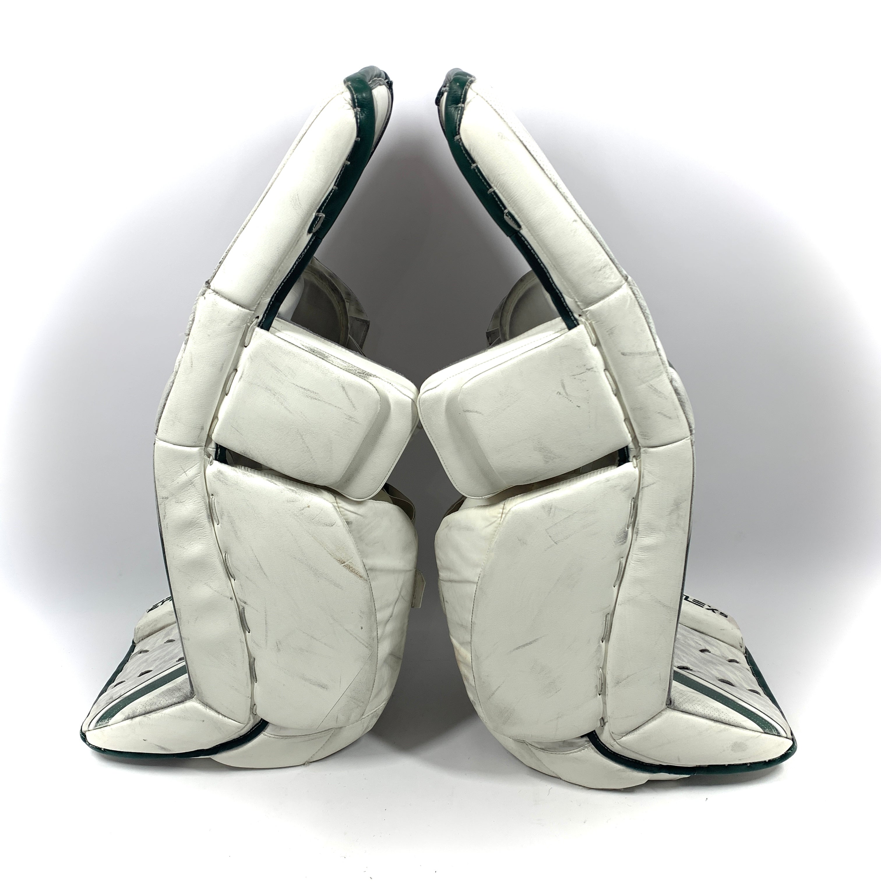 CCM Extreme Flex 5 - Jambières de gardien de but Pro Stock d'occasion (blanc/vert)